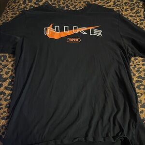 Nike Men’s Black Short Sleeve Tee with Orange Swoosh and White Outline